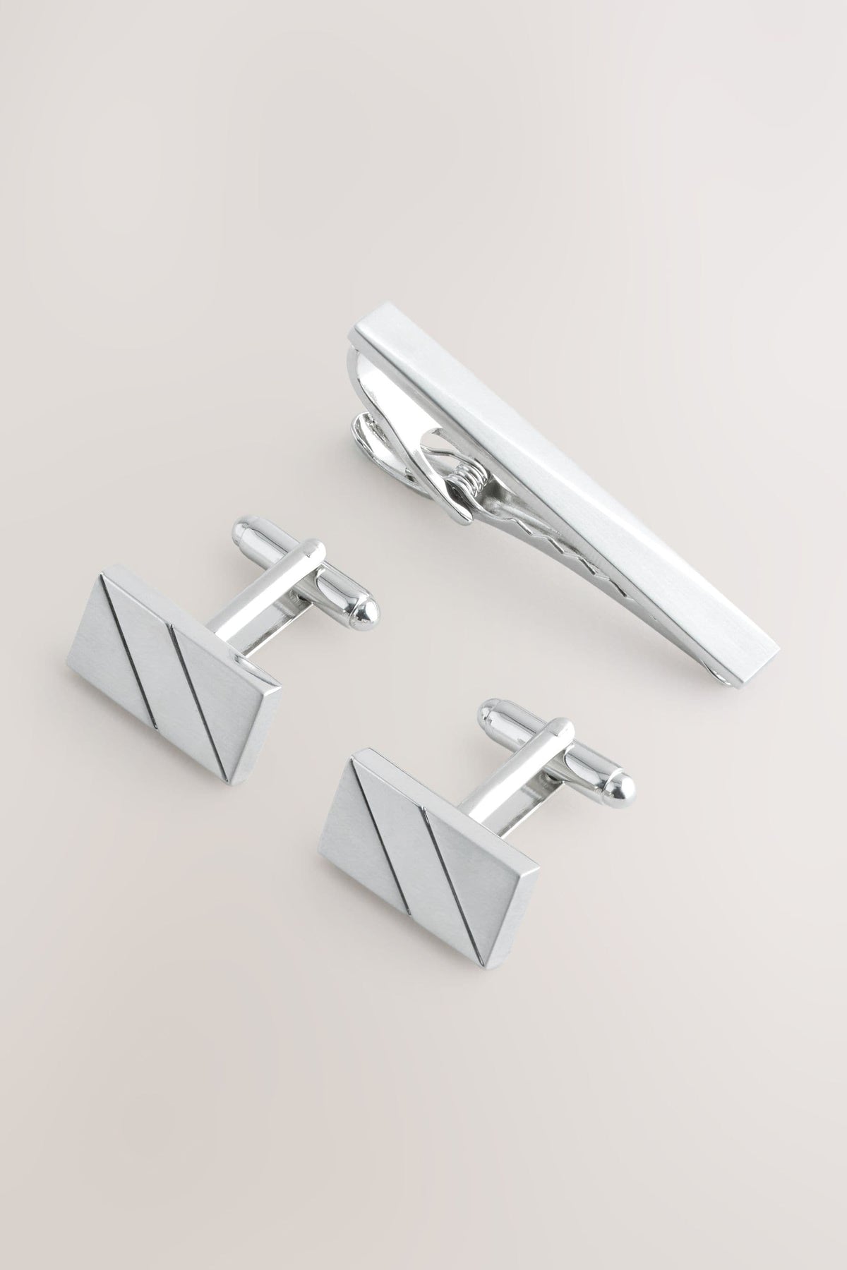 Silver Tone Cufflinks And Tie Clip Set