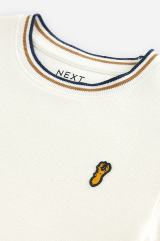 NEXT