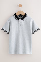 NEXT - POLO SS TIP TXT GEO