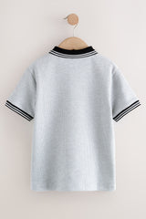 NEXT - POLO SS TIP TXT GEO