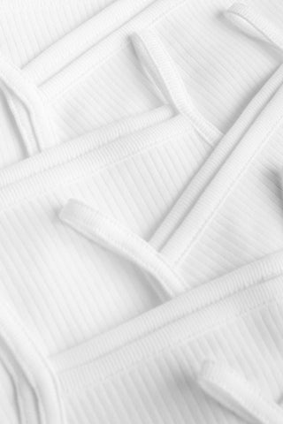 White Strappy Baby Bodysuits 5 Pack